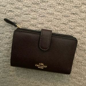 Coach leather bifold wallet. Oxblood